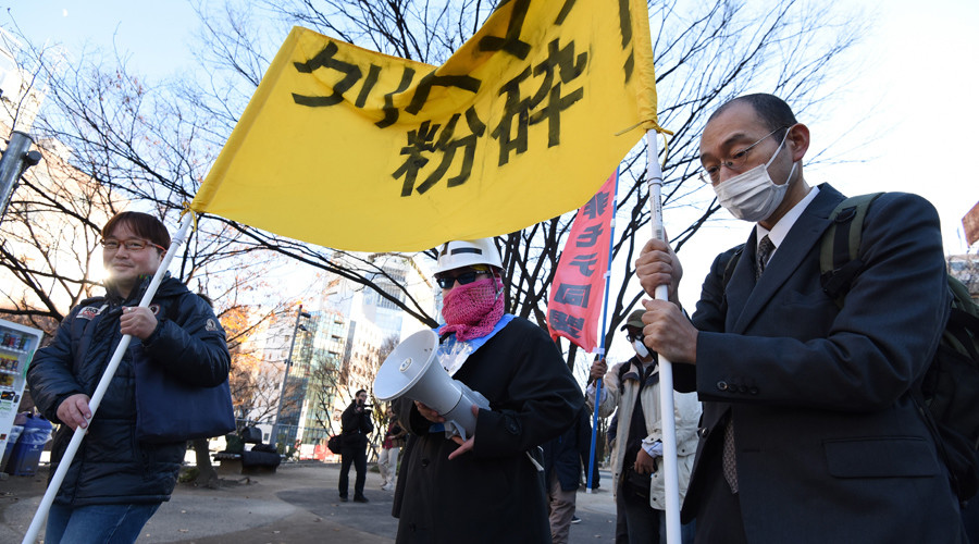 ‘Smash capitalist Christmas!’ Angry singletons stage anti-Xmas rally in Tokyo