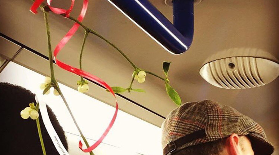 London’s blushing! Mistletoe on Tube network causes awkward commute