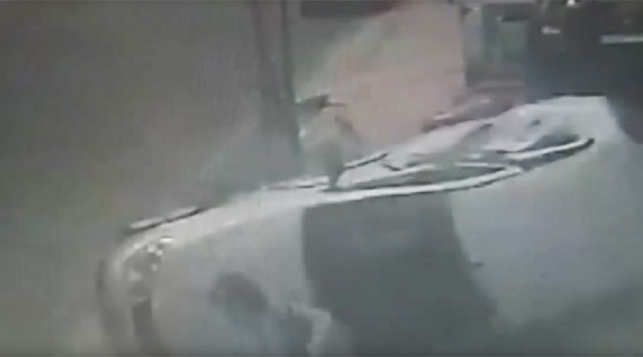 Lucky escape: Crashed car misses pedestrians by inches (VIDEO)