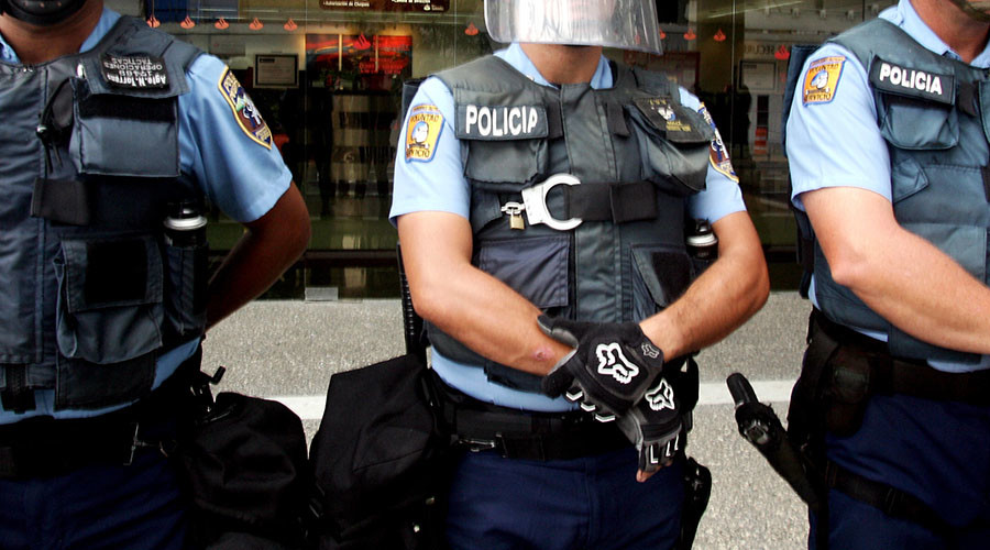 Puerto Rico policeman takes 3 colleagues hostage before shooting them
