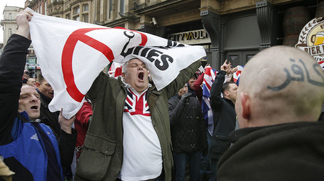 A man gestures during a demonstration by supporters of the Pegida movement in Newcastle, northern England, February 28, 2015. © Peter Nicholls