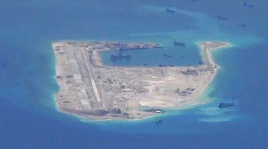 China lands 1st civilian plane on disputed islands, sparks neighbors' military fears