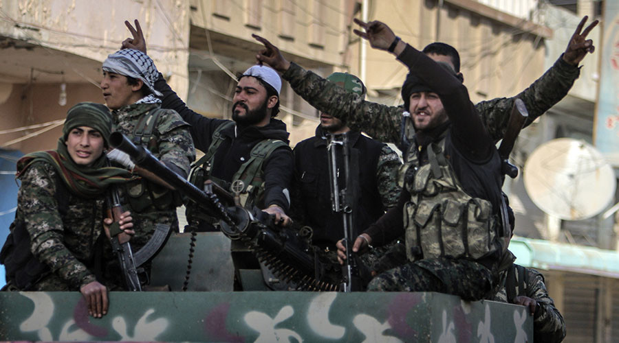 Fighters of the Kurdish People's Protection Units (YPG). © Rodi Said
