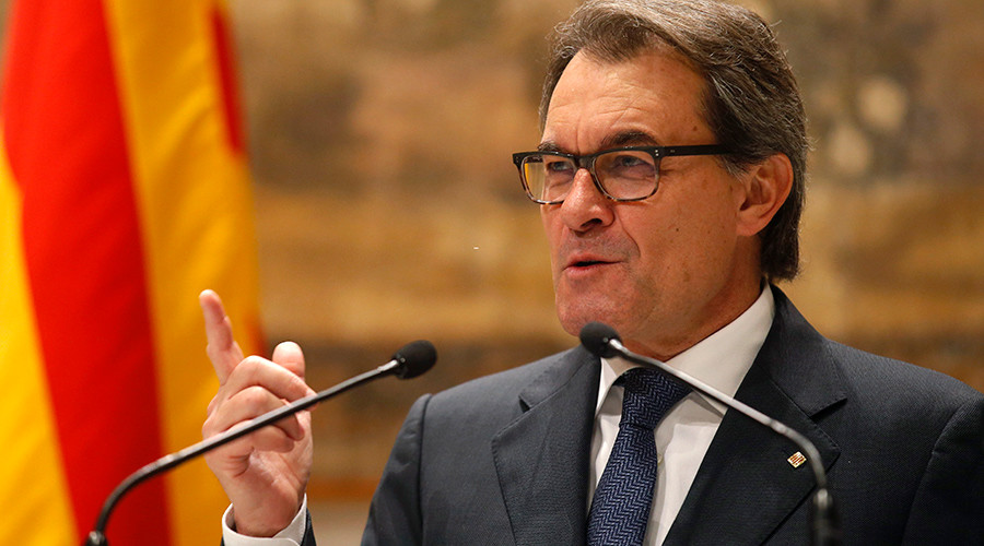 Catalonia’s Mas steps down as president in deal to form new regional govt