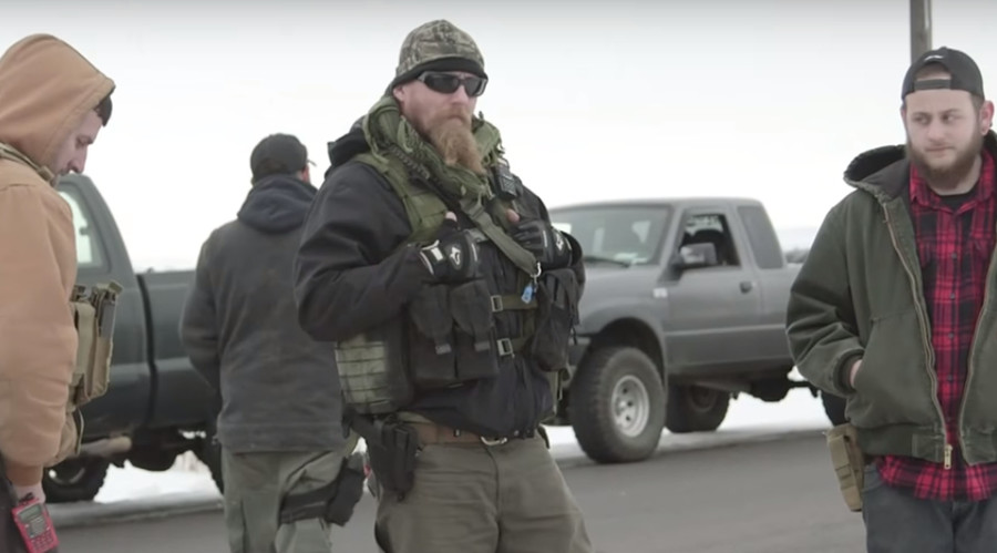 Oregon refuge occupiers dismiss armed supporters, start negotiating with FBI