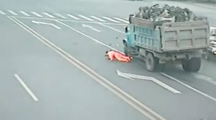 Trashed: Chinese garbage man survives head-on truck collision (VIDEO)