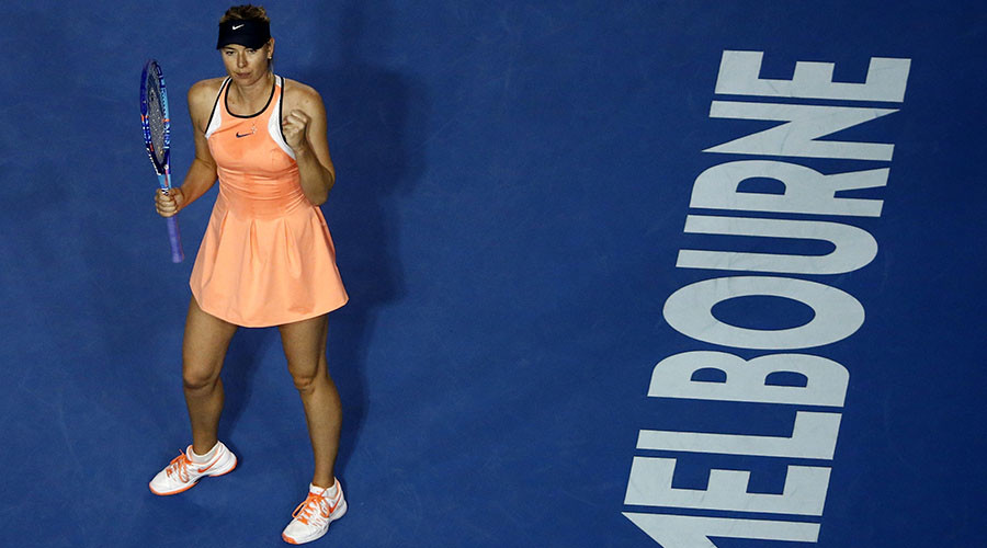 Sharapova changes dress, wins 600th career match