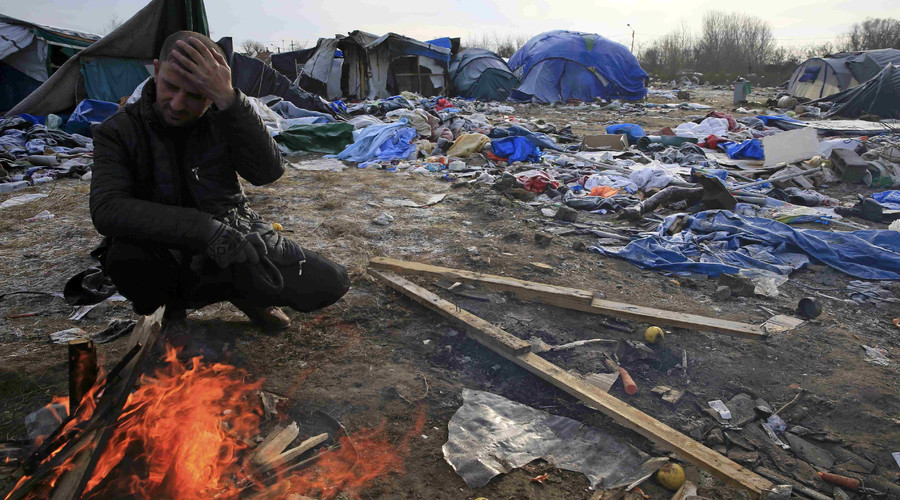 ‘Support our city!’ Calais residents rally for peaceful life after port seizure by immigrants
