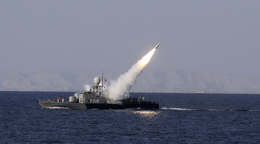 Iran holds naval drills, asks US warship to stay away