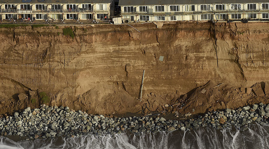 California homes on the brink, Chilean coast battered: El Nino wreaks havoc on Pacific regions