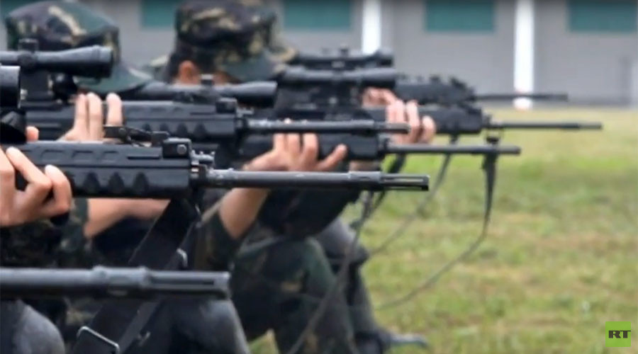 Chinese snipers show off firing skills in heavy rain (VIDEO)