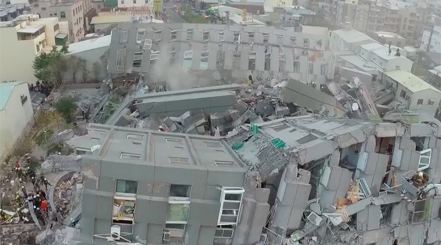 Taiwan residential tower toppled by deadly 6.4 quake (AERIAL FOOTAGE)