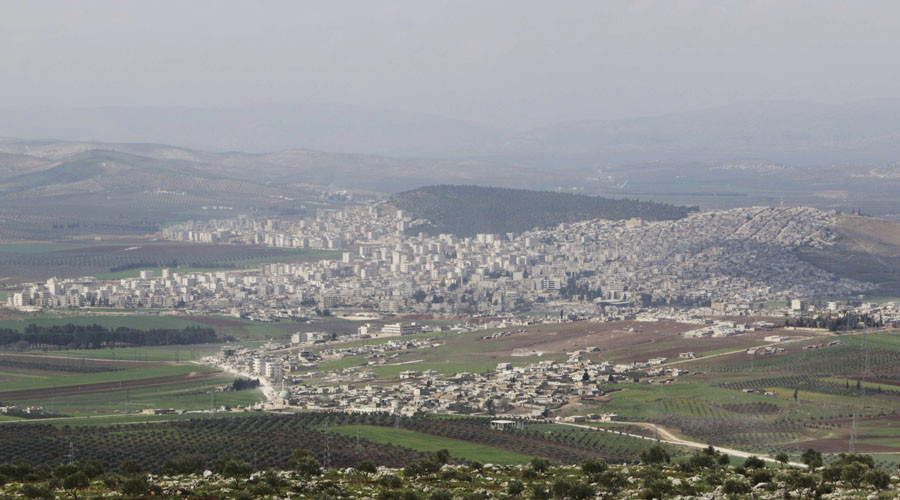 Dozens of Turkish military vehicles cross Syria border, dig trenches – report