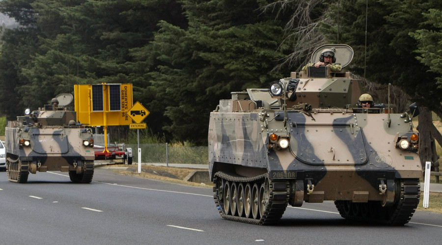 Australia to bolster defenses, wants to keep good terms with both US and China