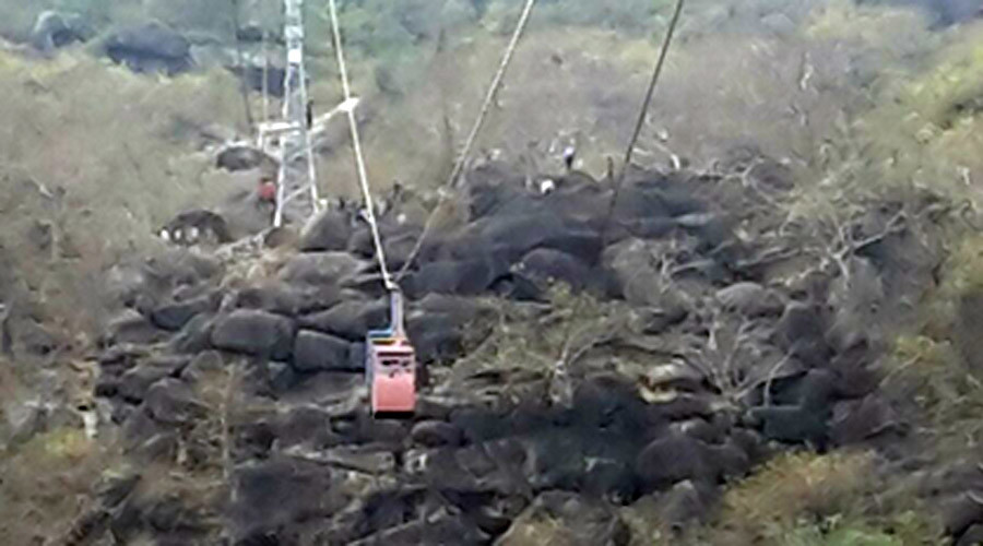 Cable car falls, injuring & trapping tourists near hilltop Indian temple