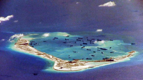 Chinese dredging vessels seen in the waters around Mischief Reef in the disputed Spratly Islands in the South China Sea. © HO