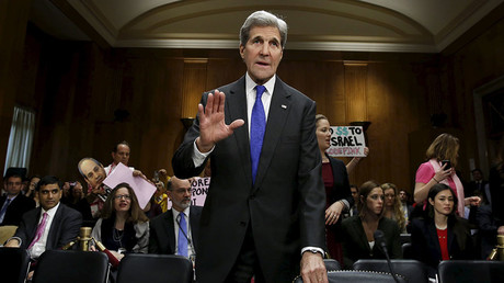 U.S. Secretary of State John Kerry waves as he arrives at a Senate Foreign Relations Committee hearing on the FY2017 State Department Budget Request on Capitol Hill in Washington, February 23, 2016. © Yuri Gripas