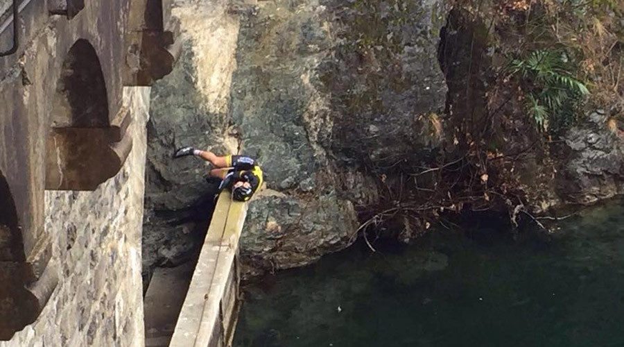 Lucky to be alive: Cyclist survives 39ft fall into freezing lake (PHOTOS)