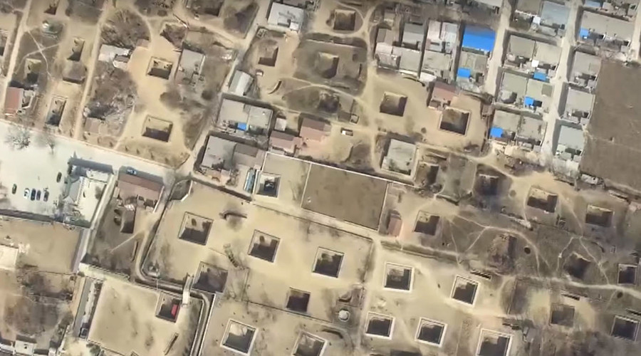 Deeper underground: Drone films incredible Chinese cave homes (VIDEO)