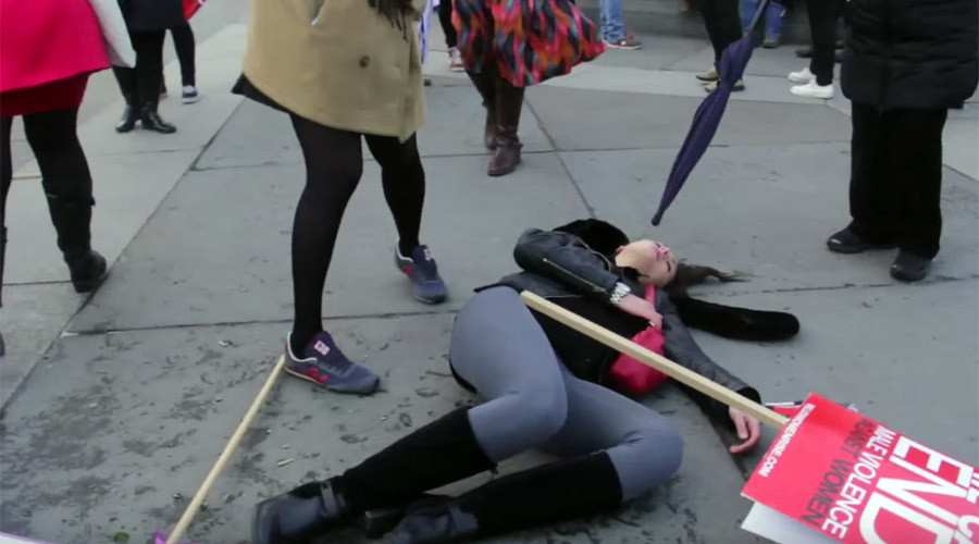 Joke too far? Pranksters ‘bottle’ women at domestic abuse demo (VIDEO)