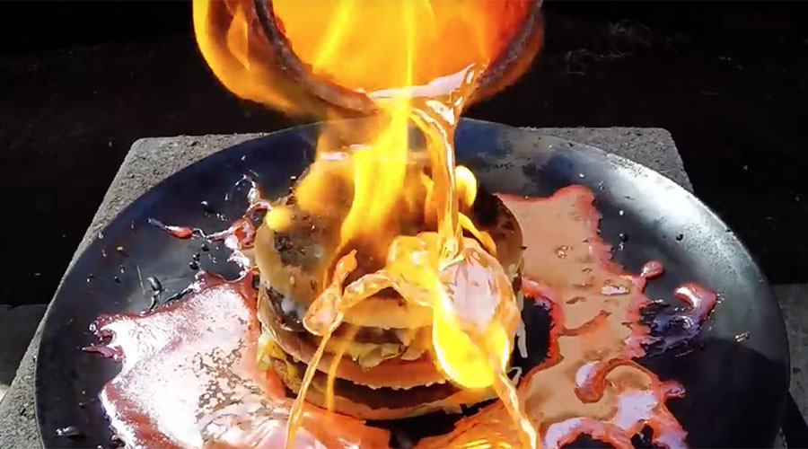 Molten copper struggles to break down Big Mac, stunning the internet (VIDEO)