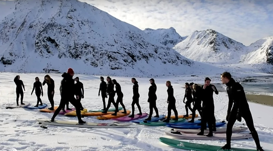 Endless winter: Insane arctic surfers tame Norway’s icy waves (VIDEO)