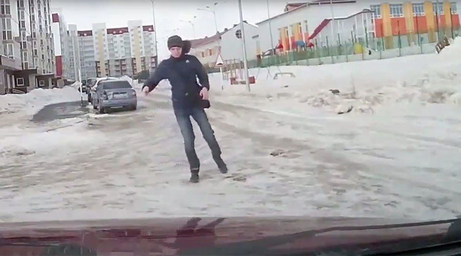 Old man takes on extreme winds… & loses (VIDEO)