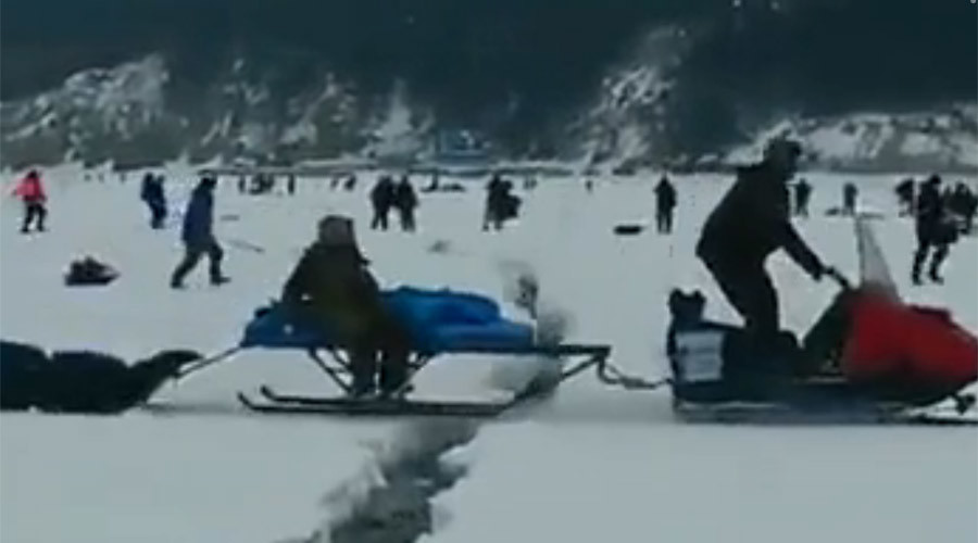 Dramatic escape for Russian fishermen as frozen lake cracks underfoot (VIDEO)