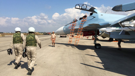 The crew of a Russian Su-30 fighter prepare to take off at Hmeimim aerodrome in Syria. © Dmitriy Vinogradov