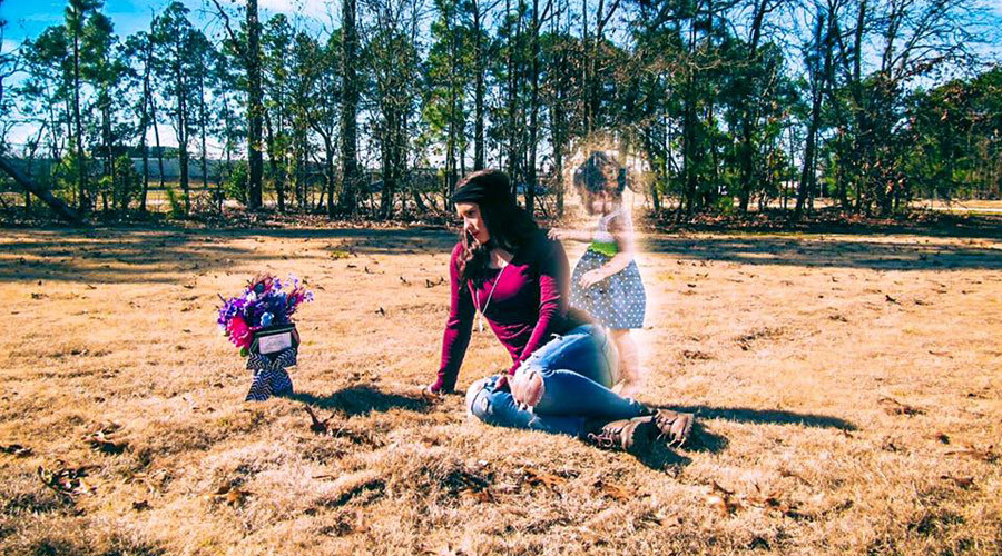 'Soldier mom' who posed in ghostly photoshoot charged with murder of 2yo daughter