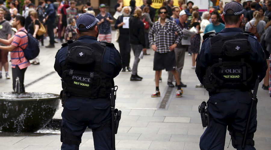 'Scum! Shame!' Melbourne police pepper-spray protesters outside Liberal party fundraiser (PHOTOS)