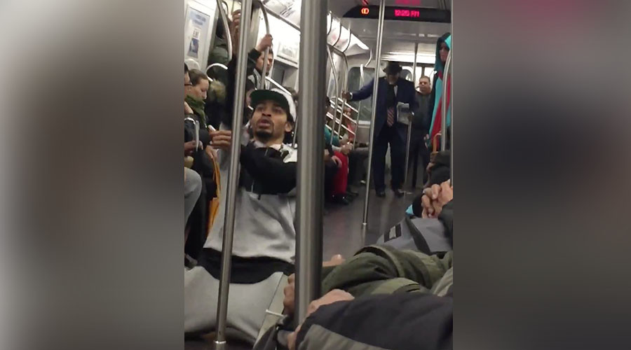 Businessman challenges street performer in NYC subway dance-off (VIDEO)