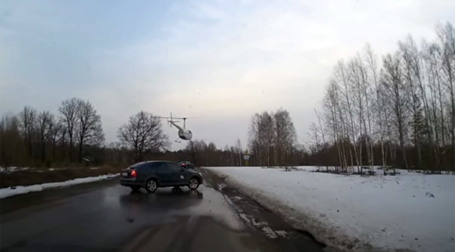 From on high: Priest’s chopper lands on highway in Russia (VIDEO)