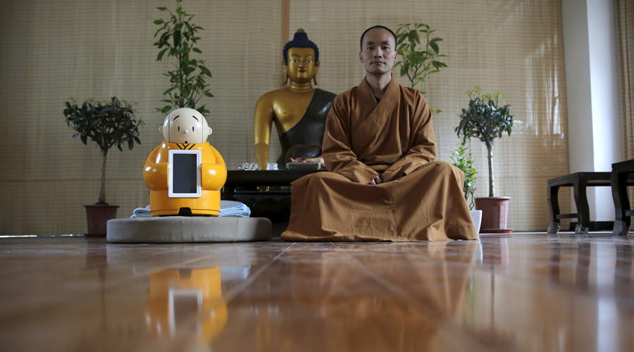 Buddha-bot: Chinese temple enlists mini monk robot to boost teachings (VIDEO)