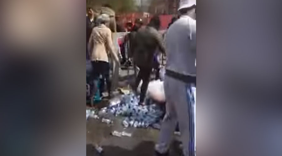 Uproar as London marathon water bottles snatched by roadside (VIDEO)