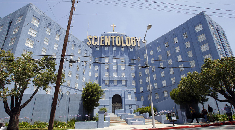 Face-off: Scientology leader threatens to sue his father over tell-all book