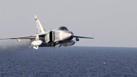 An U.S. Navy picture shows what appears to be a Russian Sukhoi SU-24 attack aircraft flying over the U.S. guided missile destroyer USS Donald Cook in the Baltic Sea in this picture taken April 12, 2016 and released April 13, 2016. © US Navy