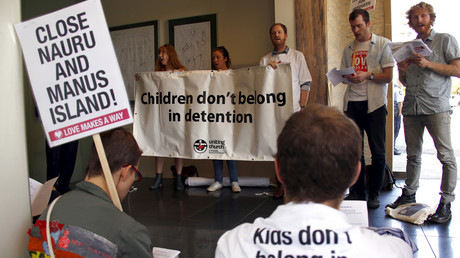 A group of around twenty protesters occupy Australian Prime Minister Malcolm Turnbull's electoral office, demanding the end to the policy of offshore detention of asylum seekers, in the Sydney suburb of Edgecliff, Australia, October 14, 2015. © David Gray 