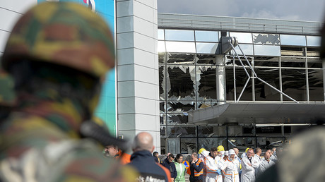 Windows of the terminal at Brussels national airport are seen broken during a ceremony following bomb attacks in Brussels metro and Belgium's National airport of Zaventem, Belgium, March 23, 2016 © Frederic Sierakowski