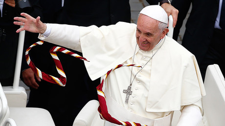 Scarves are thrown to Pope Francis at the end of a mass for the Youth Jubilee in Saint Peter's Square at the Vatican, April 24, 2016 © Tony Gentile