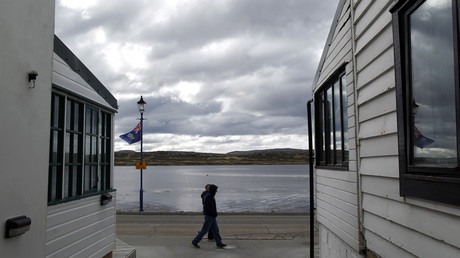 People walk on Ross road in Stanley © Marcos Brindicci 