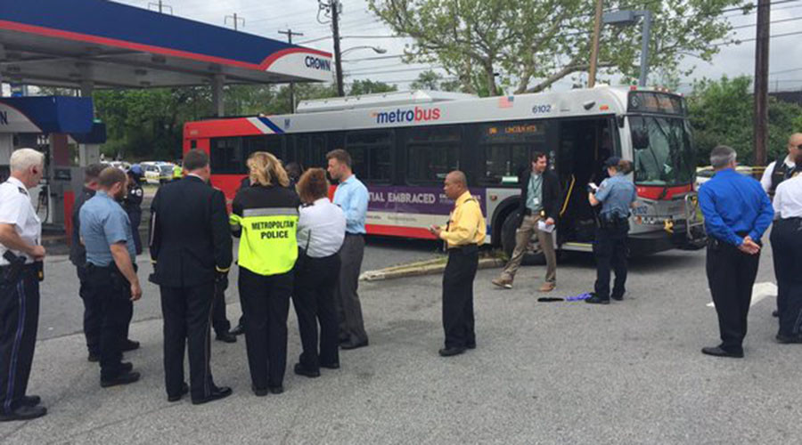 Pedestrian killed after man hijacks DC Metrobus, crashes it into gas station