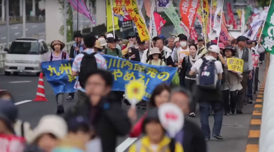 Mass protests in Japan as battle over changes to pacifist constitution looms