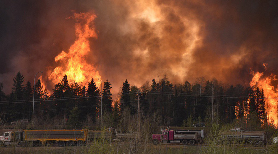 Engulfed by fire: Tens of thousands evacuating from Alberta blaze in Canada (PHOTOS, VIDEOS)