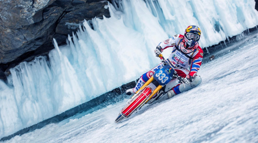 World ice-motorbiking champ dares ride on thawing Lake Baikal… with shaman’s help (VIDEO)