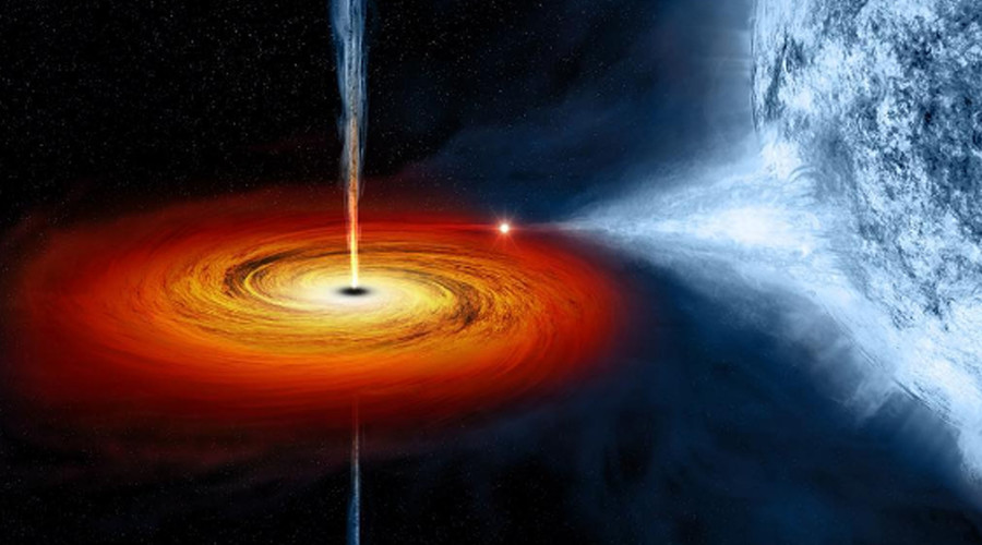 Supermassive black hole weighs in at 660mn times mass of Sun