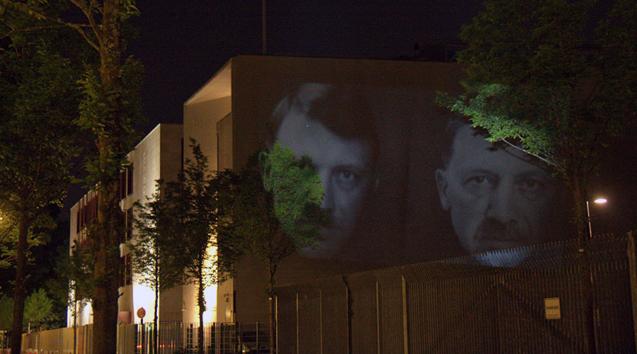 ‘Anti-ISIS campaign’: Light artists of ‘Daesh bank’ protest to fight terror backers & propaganda