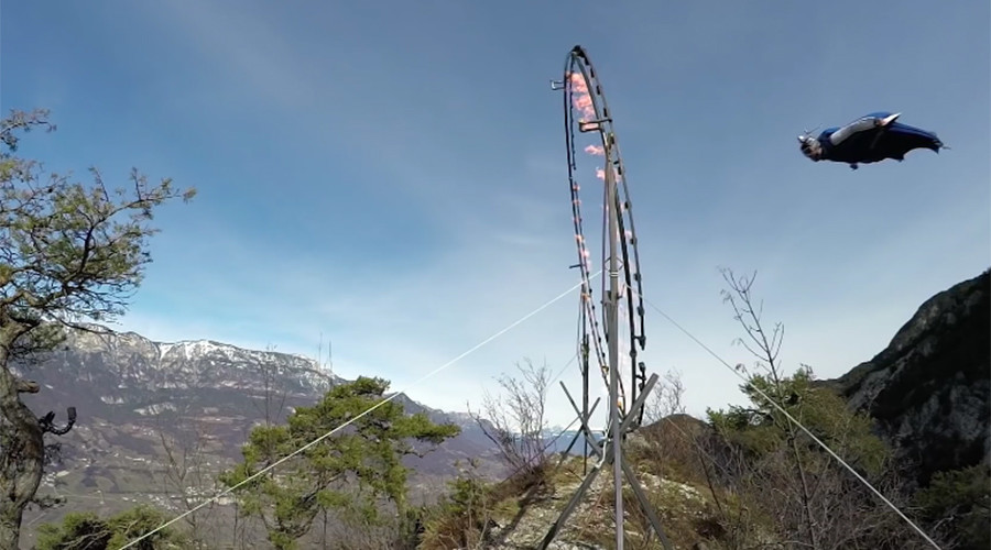 Wingsuit stuntman flies through ring of fire in unbelievable footage (VIDEO)