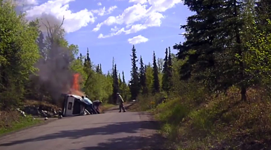Bystanders free man from car wreck moments before it bursts into flames (VIDEO)