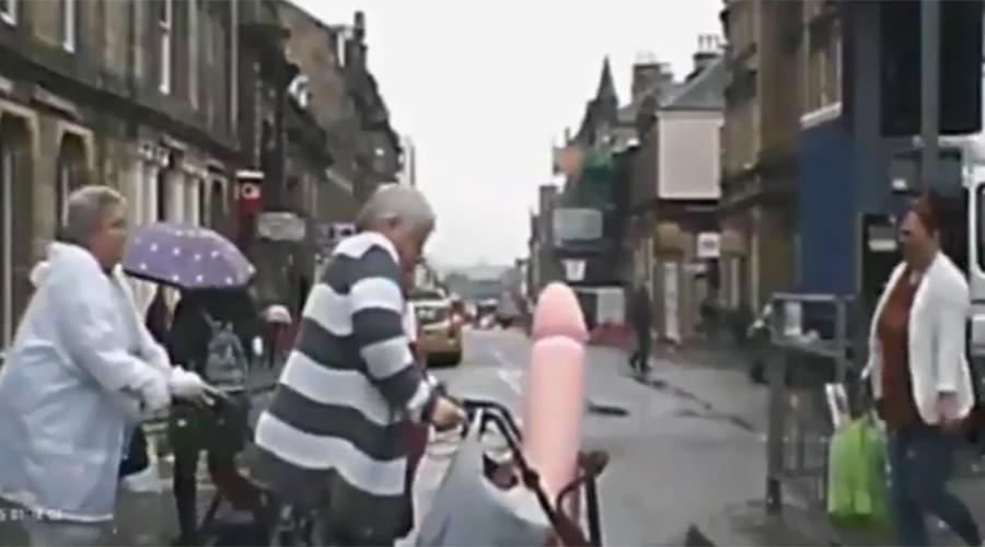 70yo woman pushing giant penis spotted in Scottish town (VIDEO)